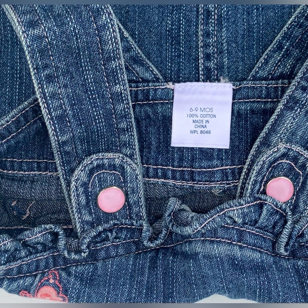 6-9 months girls denim dress with pink butterfly on it